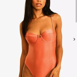 Dippin Daisy’s Dusty Rose Bodysuit with adjustable Straps
NWT